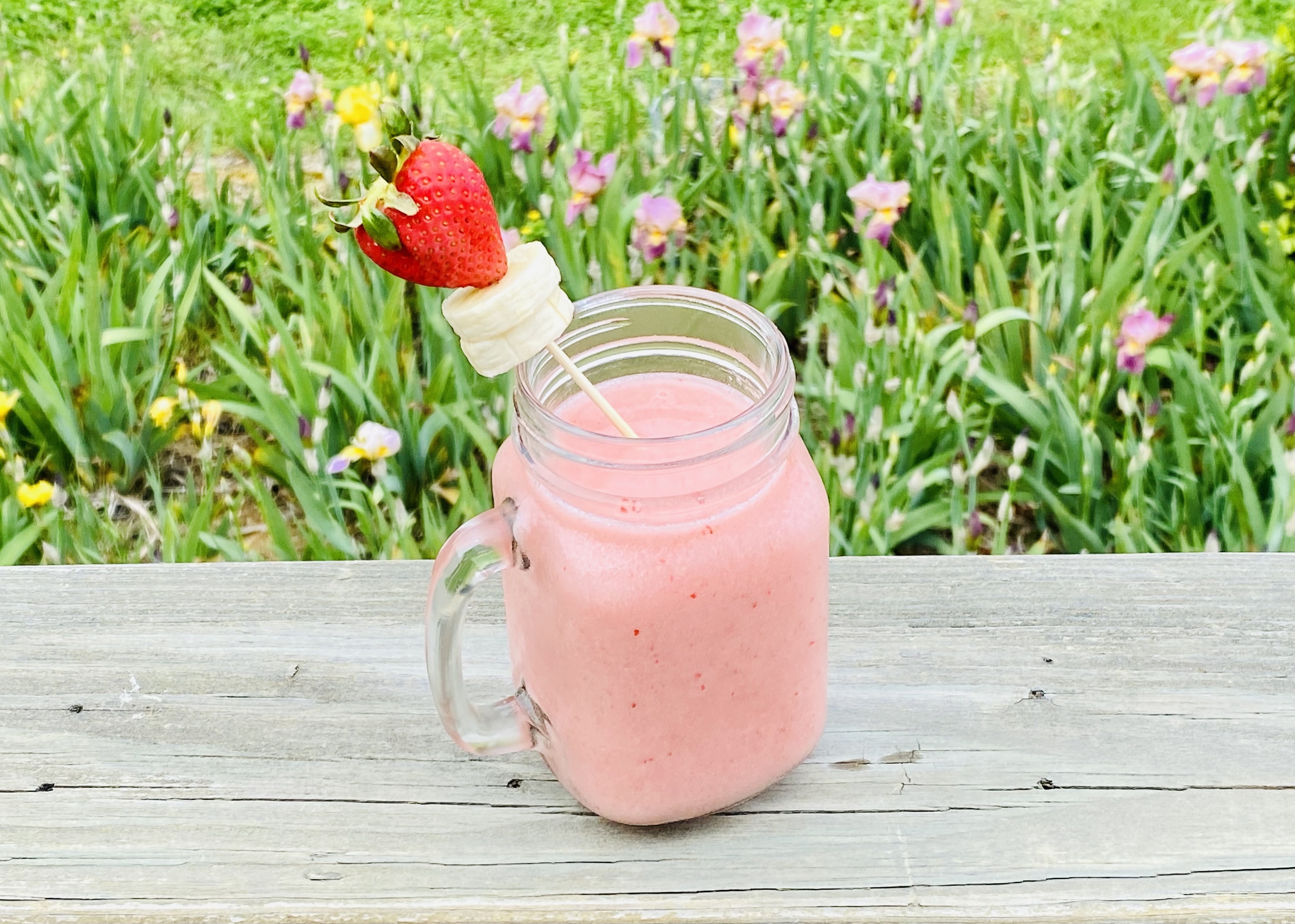 cocktail with pina colada mix, rum and strawberry and banana