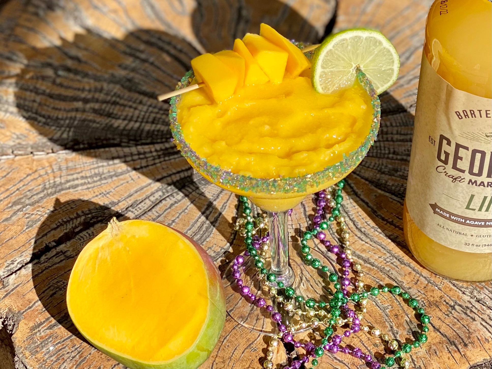 frozen margarita cocktail with mango lime margarita mix and tequila