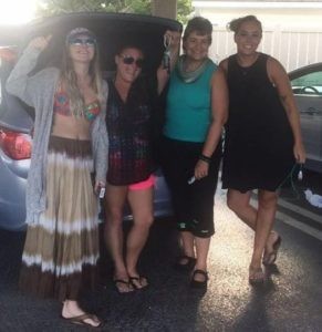 Sue with Happy Locks customers after the car was unlocked