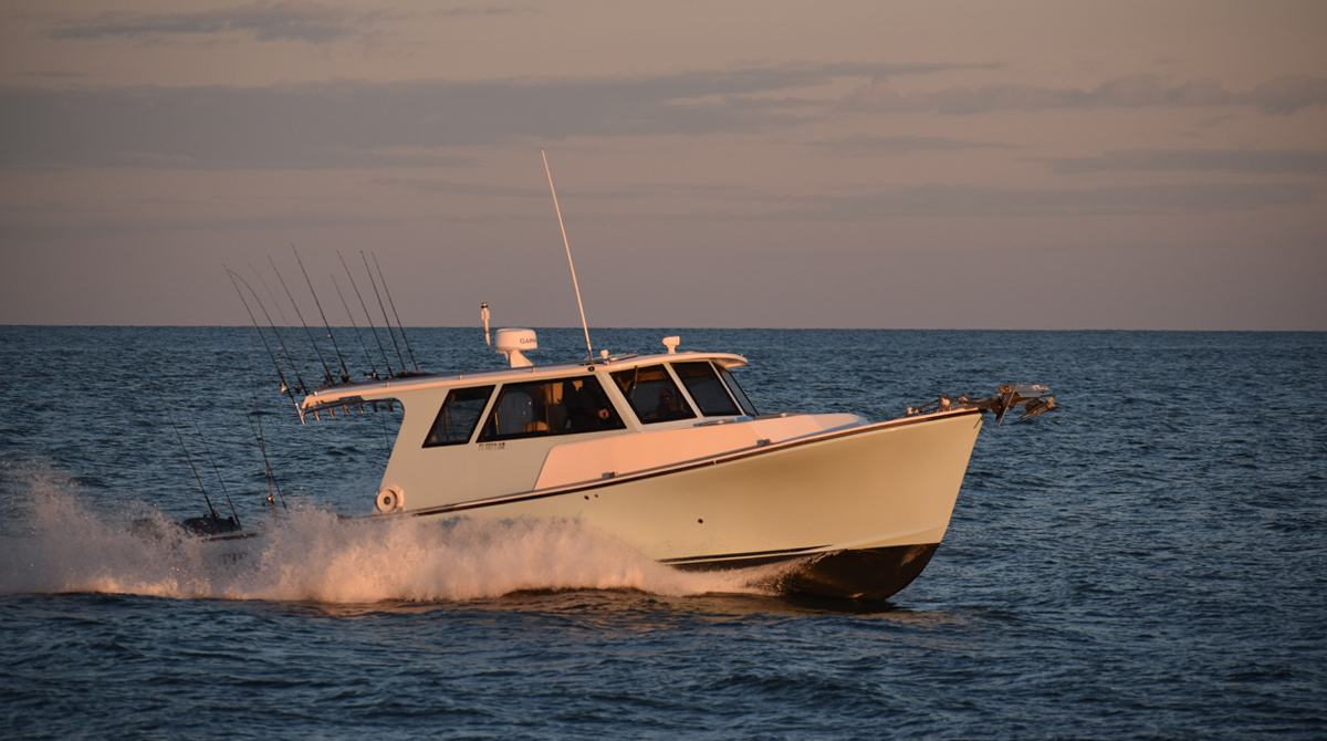 A boat on the water during a sun set