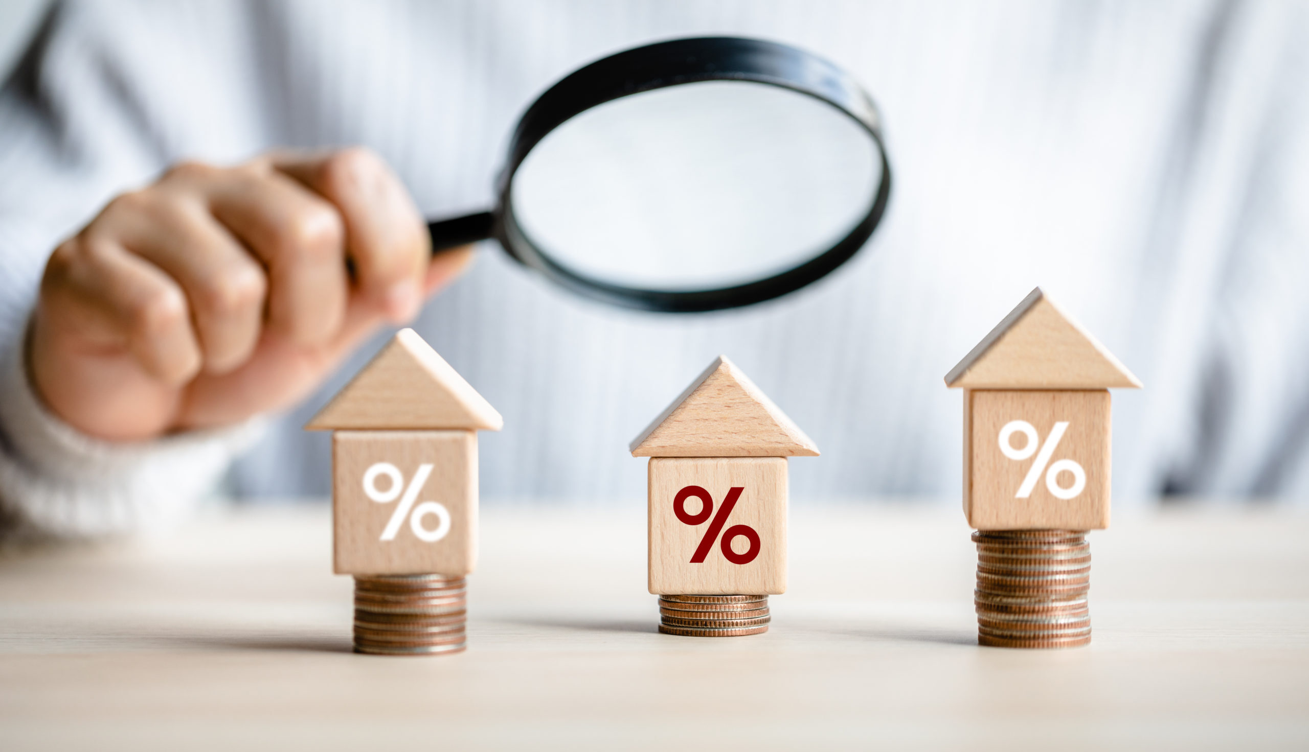 women customer using magnifying glass finding to interest rate home is minimum, affordable alternative price, mortgage home, financial and investment concept