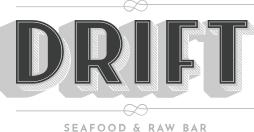 a sign that says drift seafood and raw bar