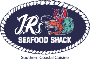 a seafood shack sign with a lobster on it