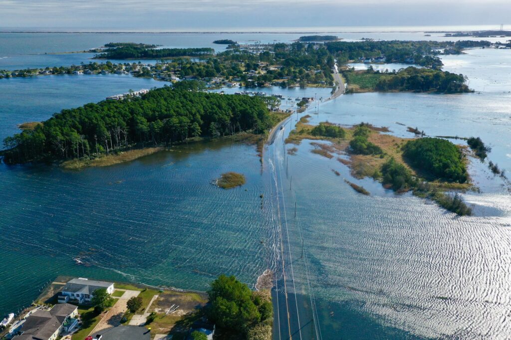 an aerial view of a small island surrounded by water
