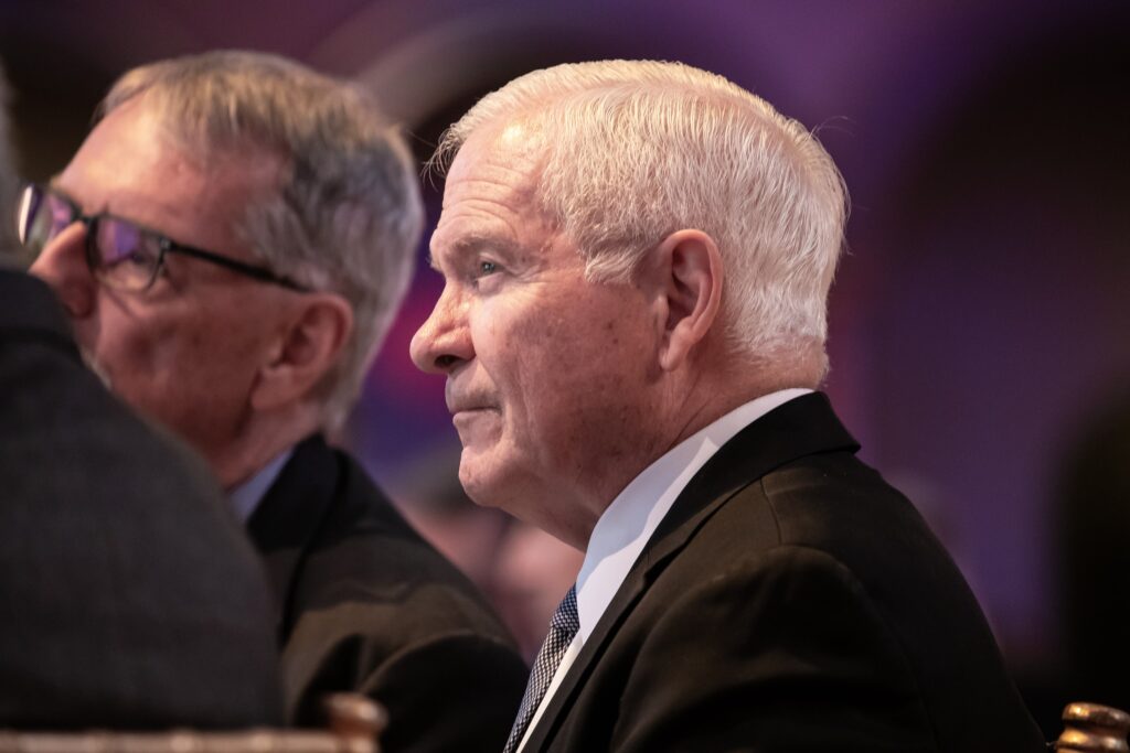 two older men sitting next to each other