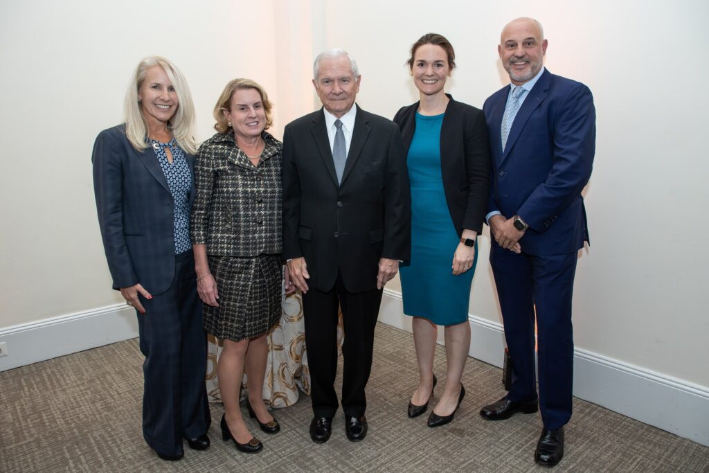 a group of people standing next to each other