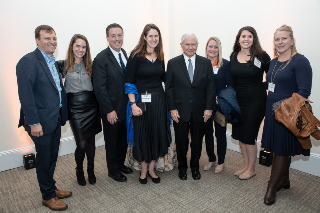 a group of people standing next to each other