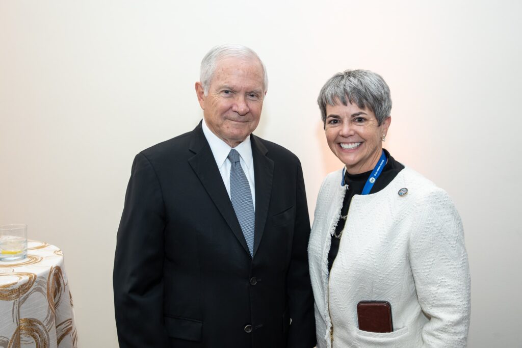 a man and woman standing next to each other