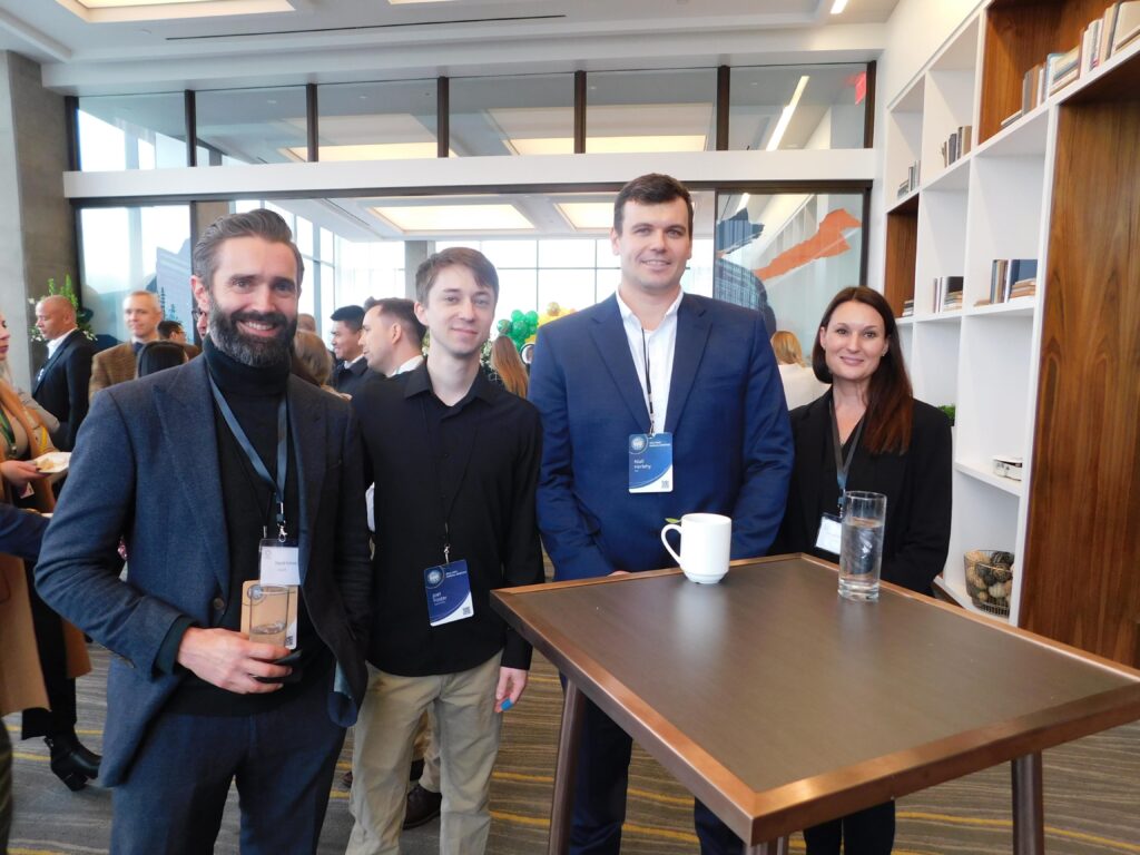 a group of people standing next to each other