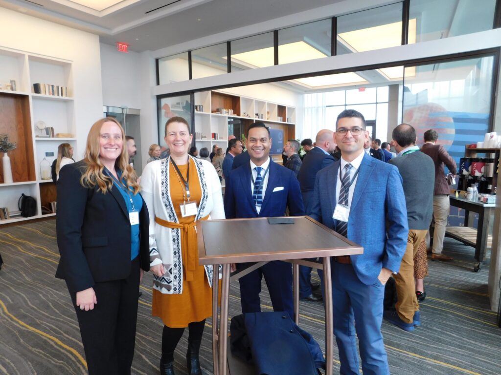 a group of people standing next to each other