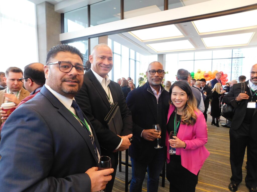 a group of men and women standing next to each other