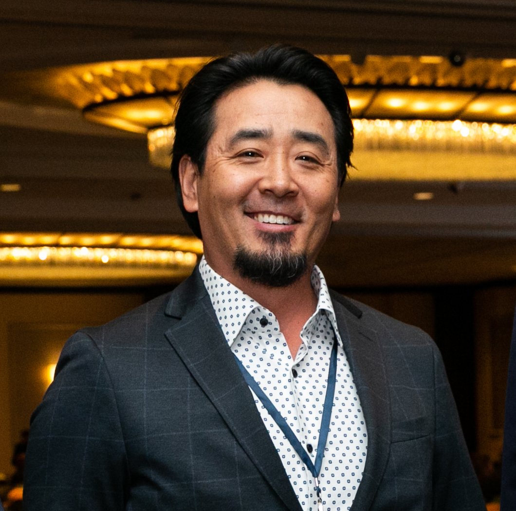 headshot of man in suit