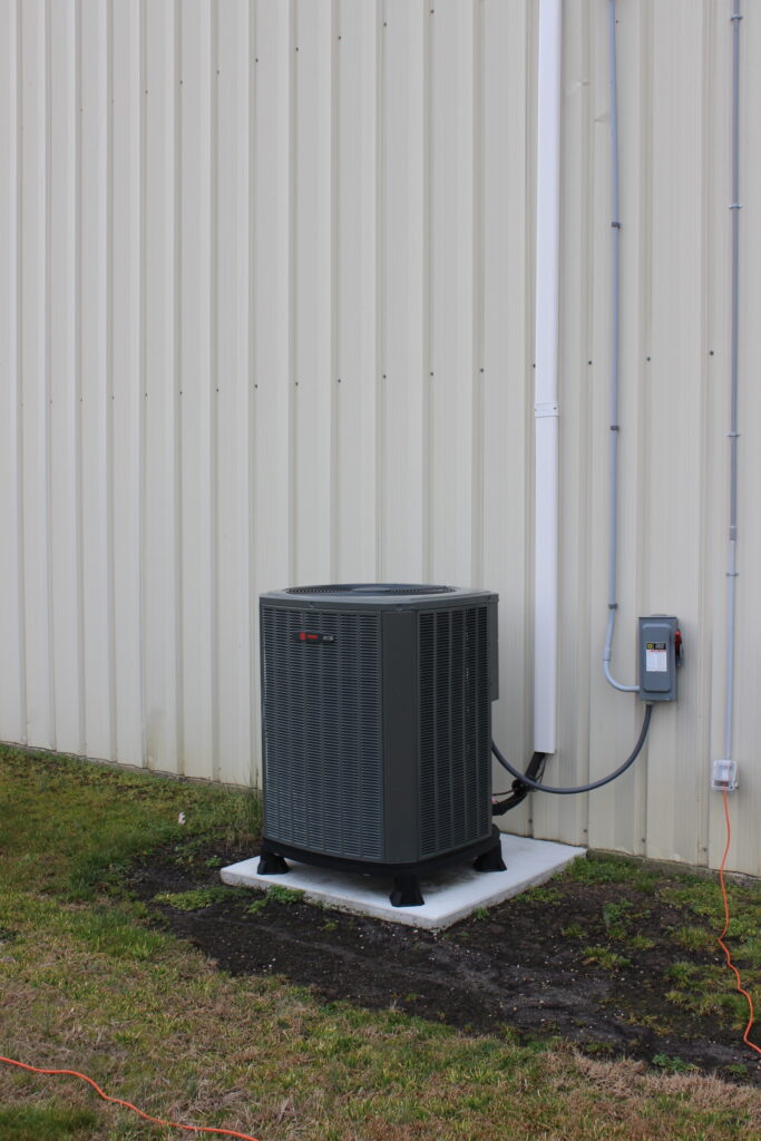 an air conditioner on the roof of a house