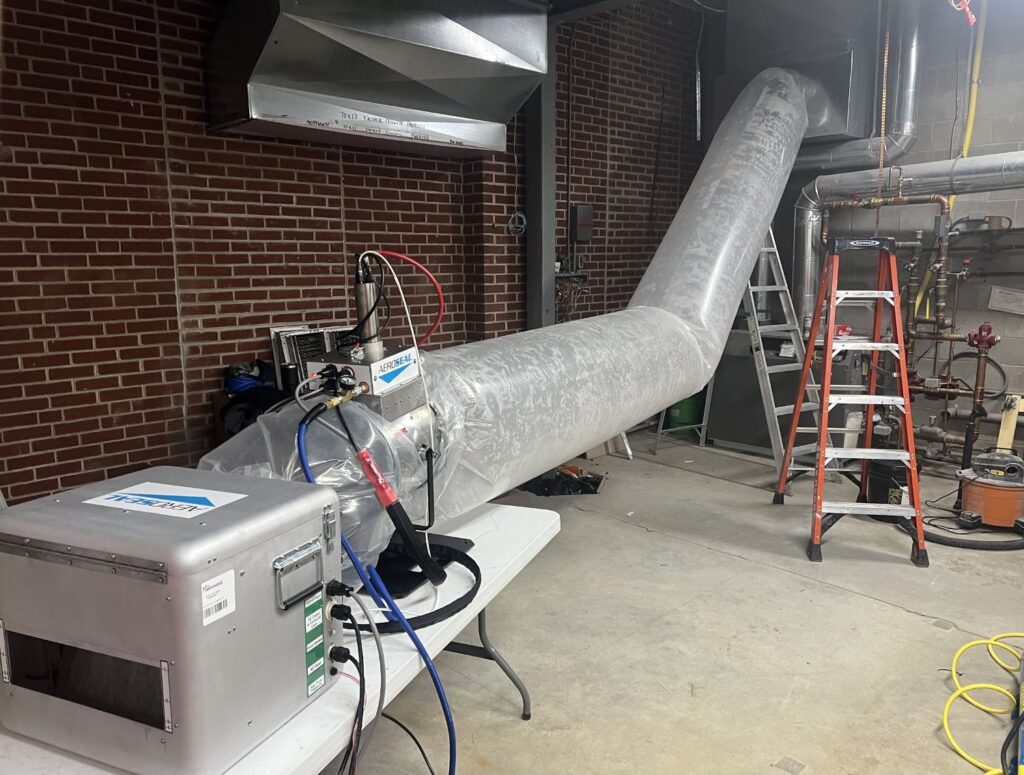 a large pipe in the middle of a room