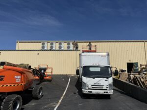 a white truck parked in front of a building