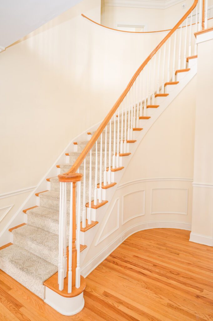 The main staircase at The Residence at King Cole Farm.
