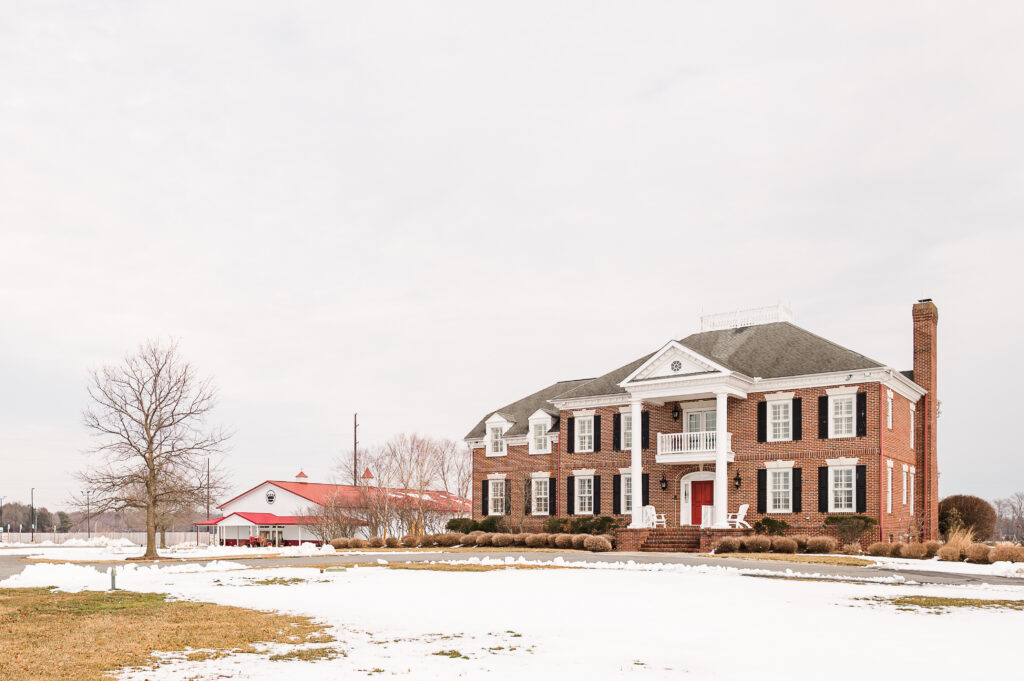 Image of The Residence and Pole Barn at King Cole Farm in the Winter featuring snow.