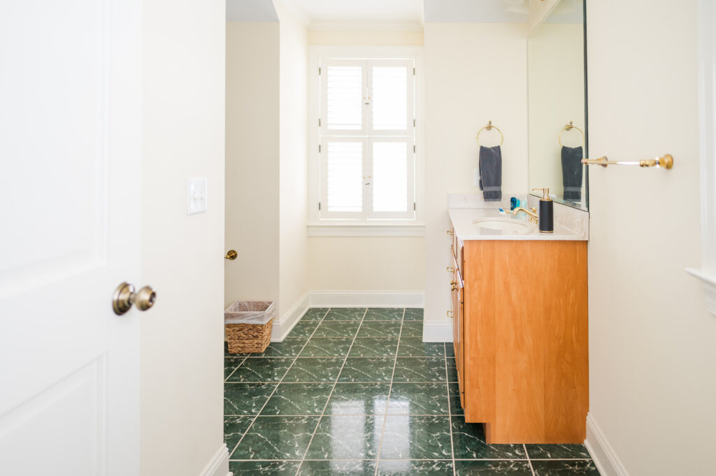 Image of the doorway entering the en-suite bathroom in the Island Sun Bedroom at King Cole Farm
