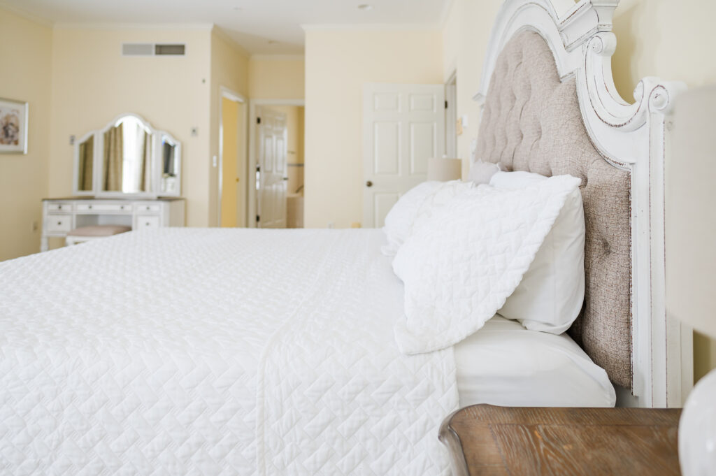 Image of the bed in the bridal suite bedroom at King Cole Farm