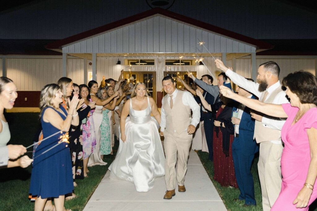 Bride & groom exit at King Cole Farm wedding venue