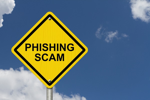 a yellow and black sign that says phishing scam