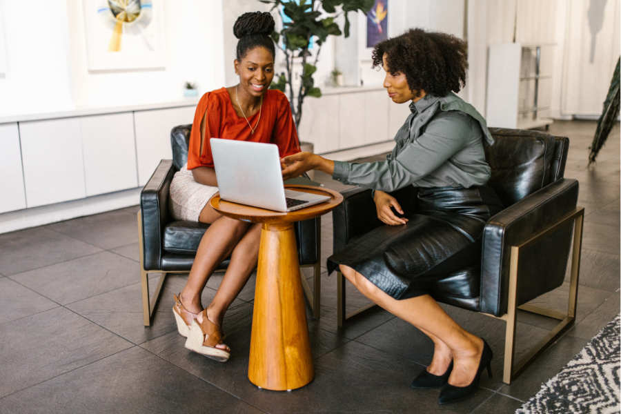 Lakeside Title Company image of two women by a laptop