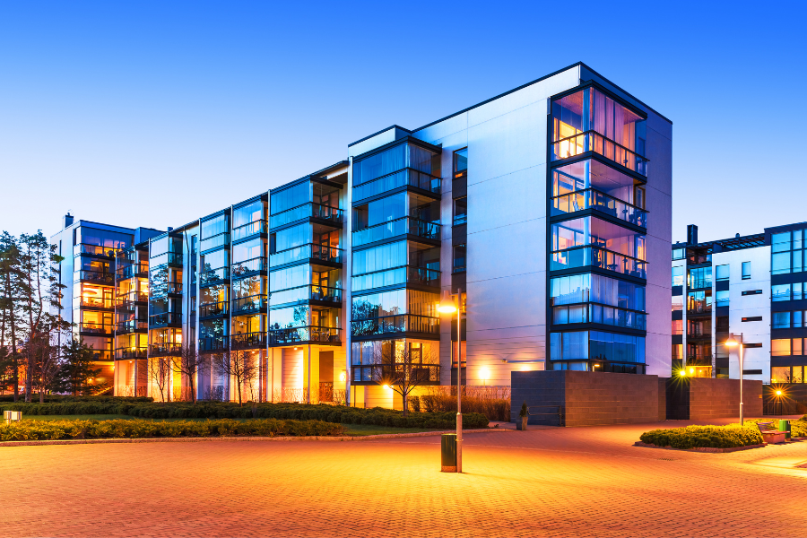 a large building with many windows lit up at night