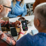 a group of people sitting around a table