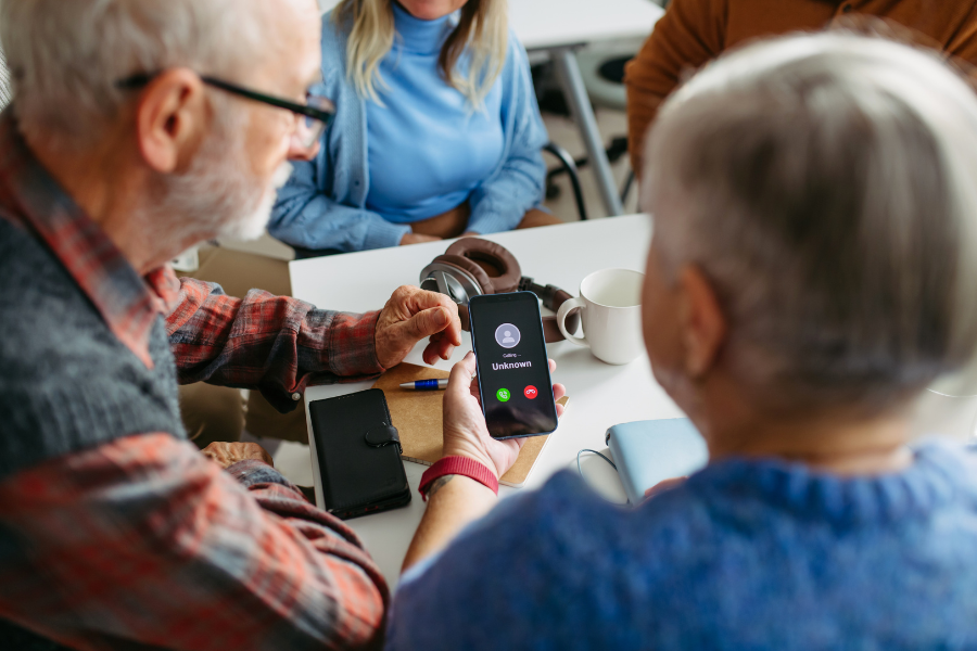 a group of people sitting around a table