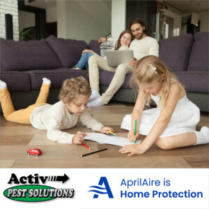 a group of people sitting on the floor in front of a couch