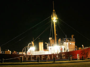 Large ship in the water at night
