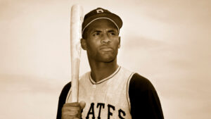 a man in a baseball uniform holding a bat