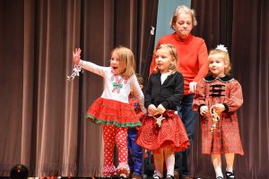 kids performing on holiday show stage