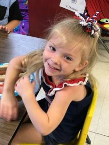 little girl smiling