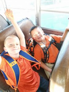 two kids on the bus
