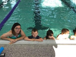 kids and mom in indoor pol