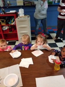 toddlers at the table