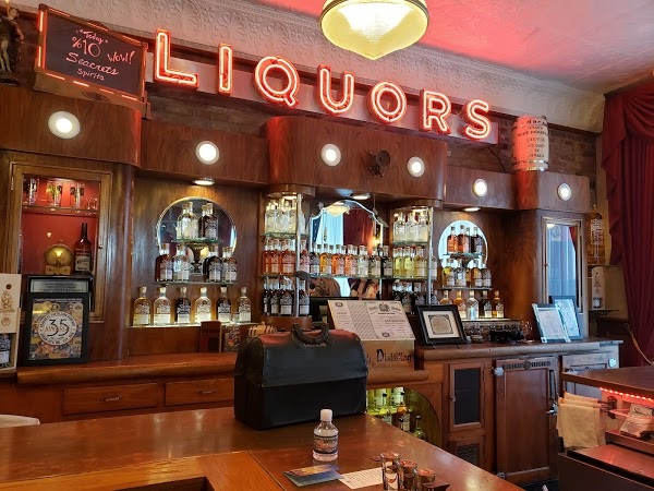 seacrets bar wtih display of liquors available