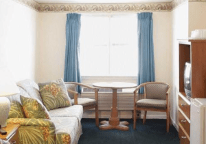 living area with love seat and table with chairs