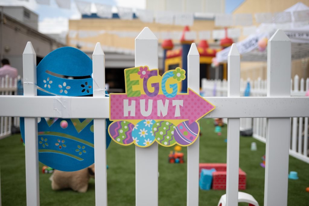 easter egg hunt sign on fence