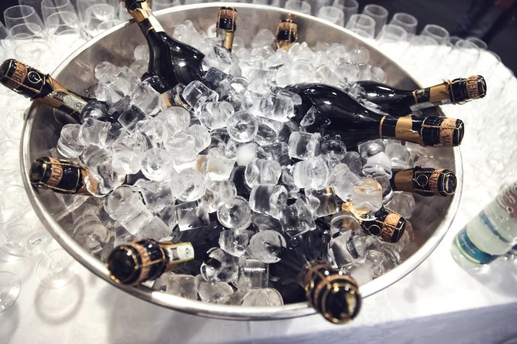 bottles of champagne in bucket of ice