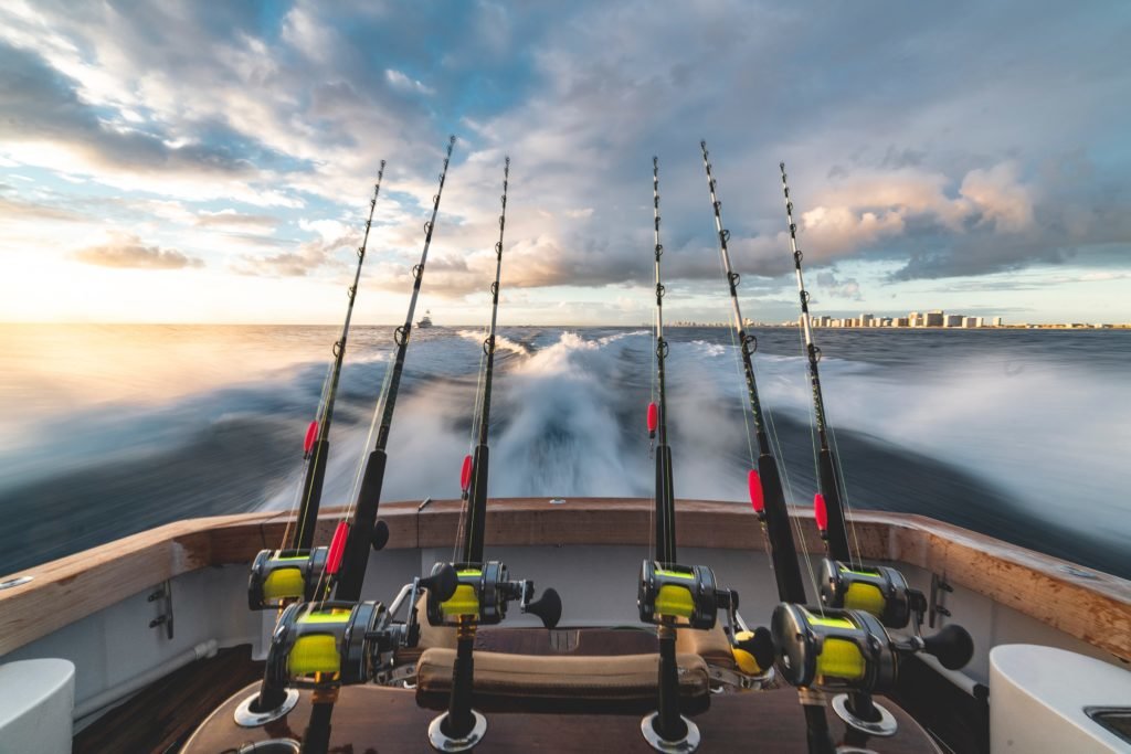 fishing rods on boat in ocean