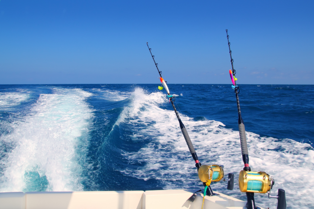Fishing boats with reels out in the sea