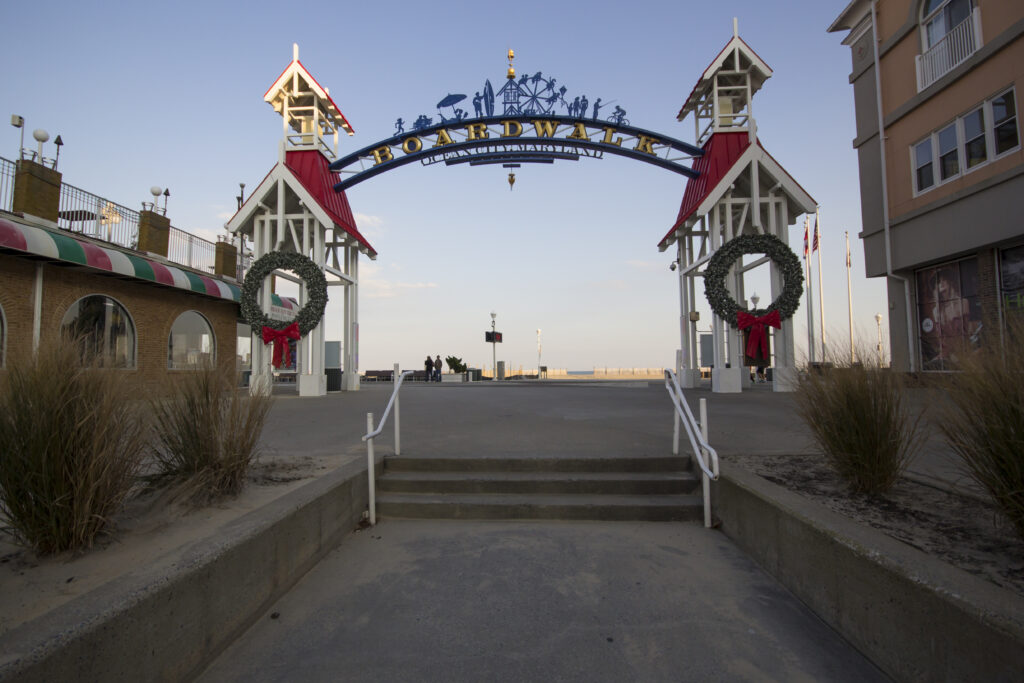 Christmas wreaths on OCMD boardwalk entrance gate