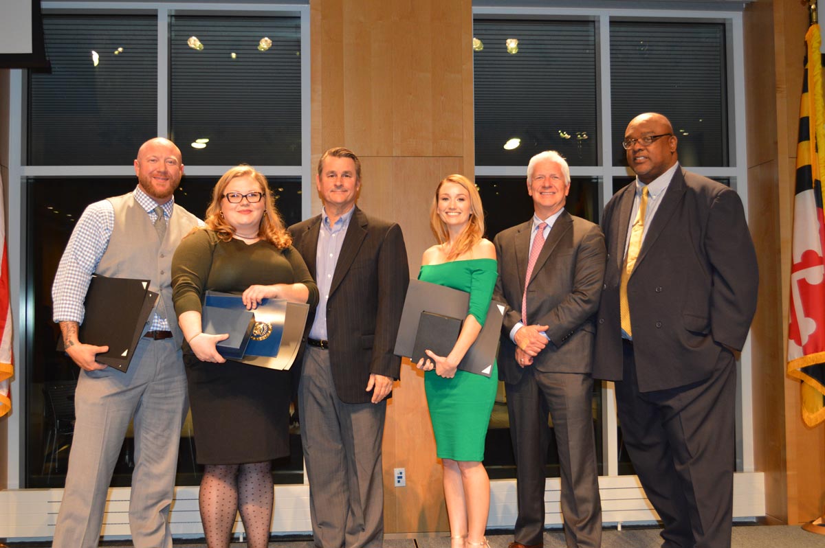 group of 2019 entrepreneur of the year finalists pose indoors