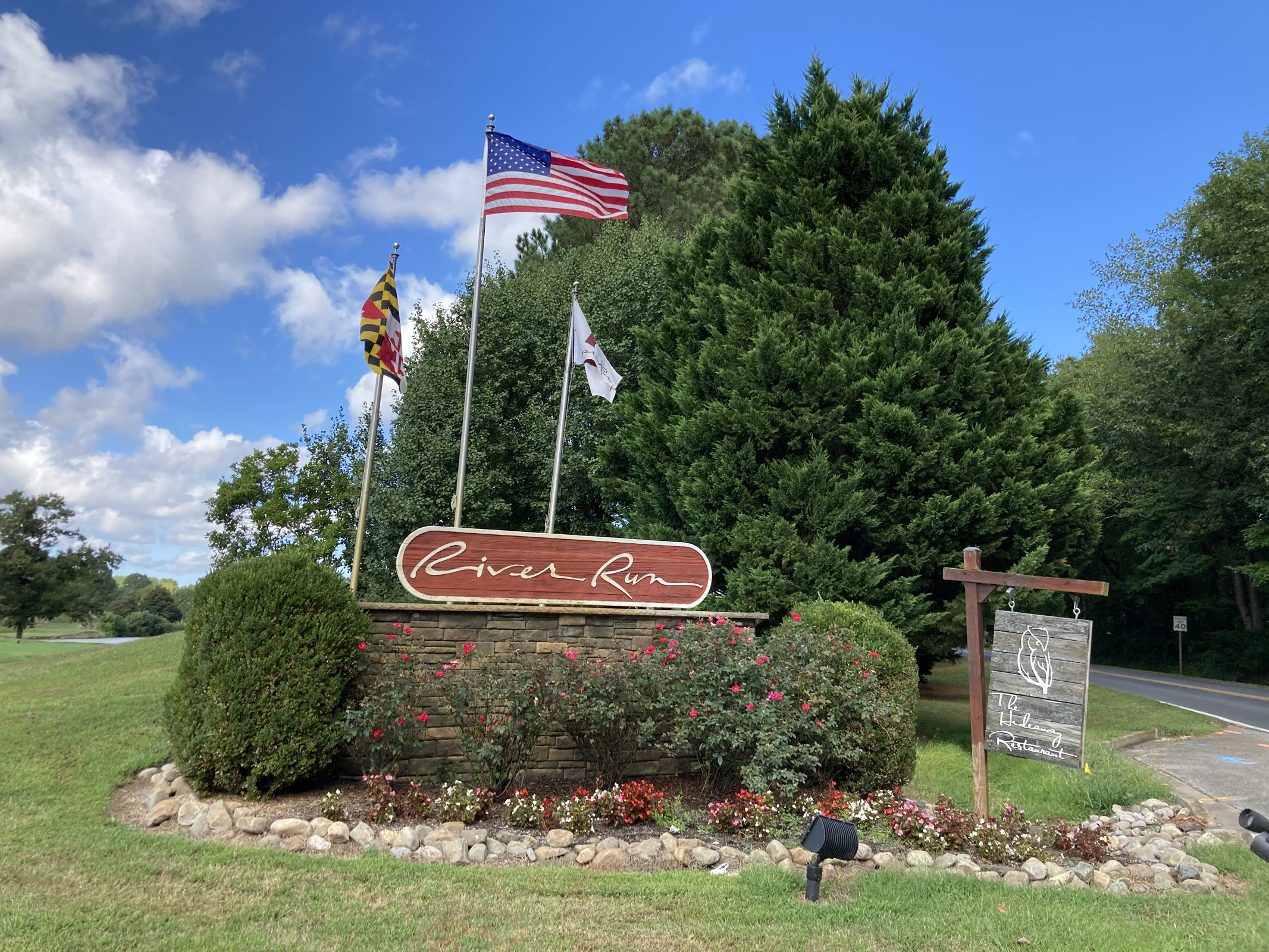 the outdoor entrance sign to River Run.