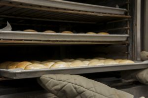 dinner rolls coming out of oven