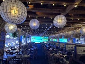 Spacious dining area with booths and tables at Nick's in Ocean City, MD