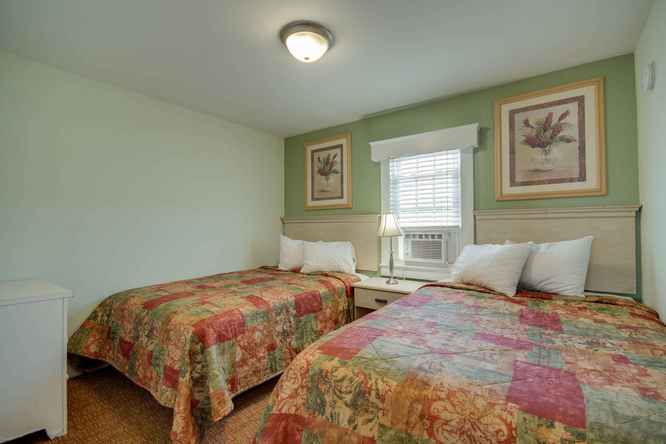 apartment bedroom with two beds