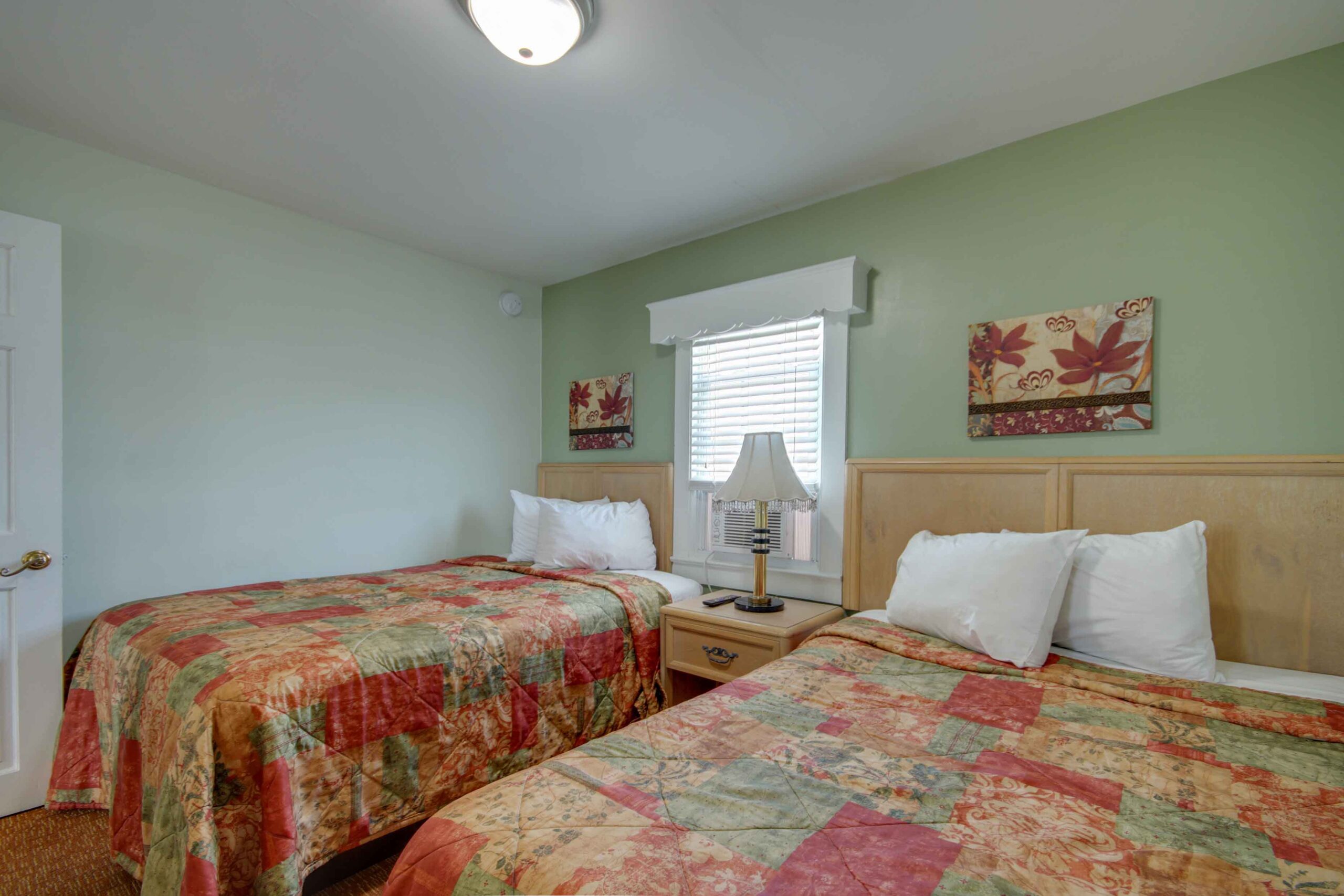apartment bedroom with two beds